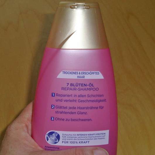 Verpackungsrückseite - Schauma 7 Blüten-Öl Repair-Shampoo